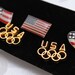 Vintage USA Olympic Rings Gold Toned Clutch Back Lapel Pins