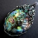Aurora borealis PENDANT made of paua shell and silver - northern lights rainbow