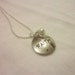 silver "faith" stamped pendant and glass pearl