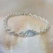 Sterling Filigree Link on an Argentium Silver Double Spiral Bracelet