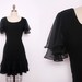 Little Black Dress with Flutter Sleeves and Low Back Size Small 1970s Vintage