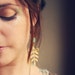 tallulah. a pair of beaded wooden leaf earrings.