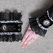 SALE - Legendary Pair of Steampunk Owl in Profile Cameo Lace cuff - Black Crushed Velvet fabric with Black / Ivory Lace