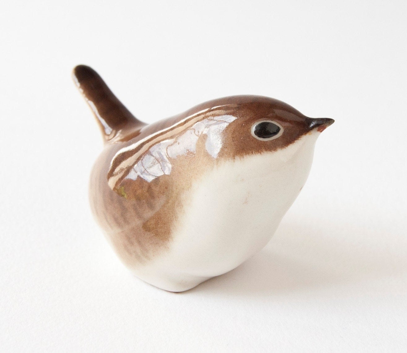 brown bird figurine