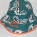 Miami Dolphins orange-brim bucket hat by Hamlet Pericles