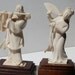 Elephant Ivory figures. Two Vintage Pre Ban Vietnamese carved real Ivory pieces on stands. Signed Tu-Van.