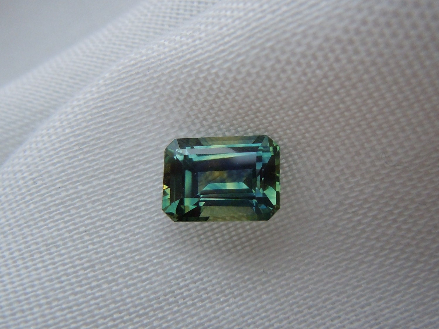 3.50 carat Fancy Montana Sapphire Emerald cut Tri color loose