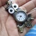 1pc antiqued bronze owl pocket watch clock charms--moving--battery included(no chains)