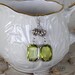 Christmas Green faceted crystal and silver dangle earrings