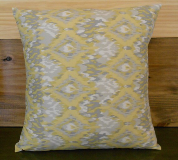 Items similar to Yellow and gray ikat decorative pillow cover on Etsy