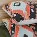 Pair of southwestern throw pillows, coral and black decorative pillows