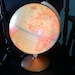 Vintage lighted Replogle globe-vintage "world premier" globe with stunning lighted feature and silver accents