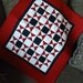 Pieced Stars in Red, White and Black 21" by 24"