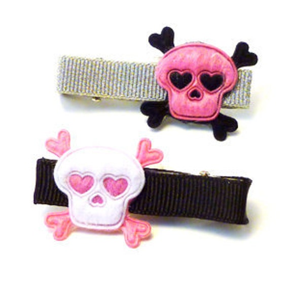 Items similar to skull 'n cross bones hair clip set on Etsy