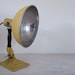 vintage industrial yellow converted heat lamp