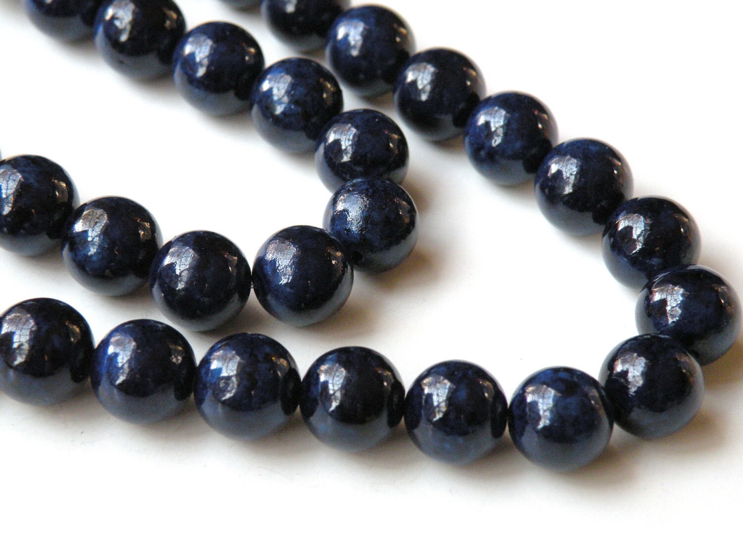 Riverstone beads in navy blue round gemstone 10mm full strand
