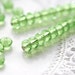 Spring green czech glass beads - faceted spacers, donuts gemstone cut - 3x5mm - 50pc - 0142