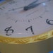 Vintage General Electric Wall Clock with Detailed Leaves