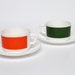 Modern milk glass cups and saucers by Arcopal France