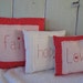 Pillow Stack Set of 3 Red Print Pillows of "Faith, Hope and Love"