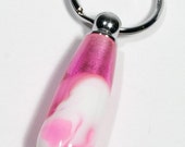 Chrome keychain made in pink and white acrylic.