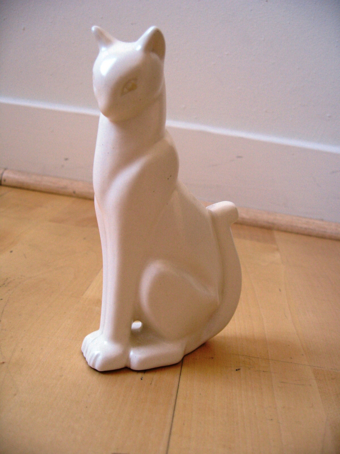 white ceramic cat figurine