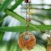 Striking Wirewrapped Peach Agate with Spinel, Mother of Pearl and Crystal Necklace