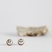 Owl ear studs in white and brown, round and flat, made of modeling clay. Come in a handprinted gift box