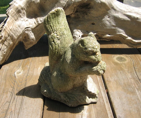 cement squirrel statue