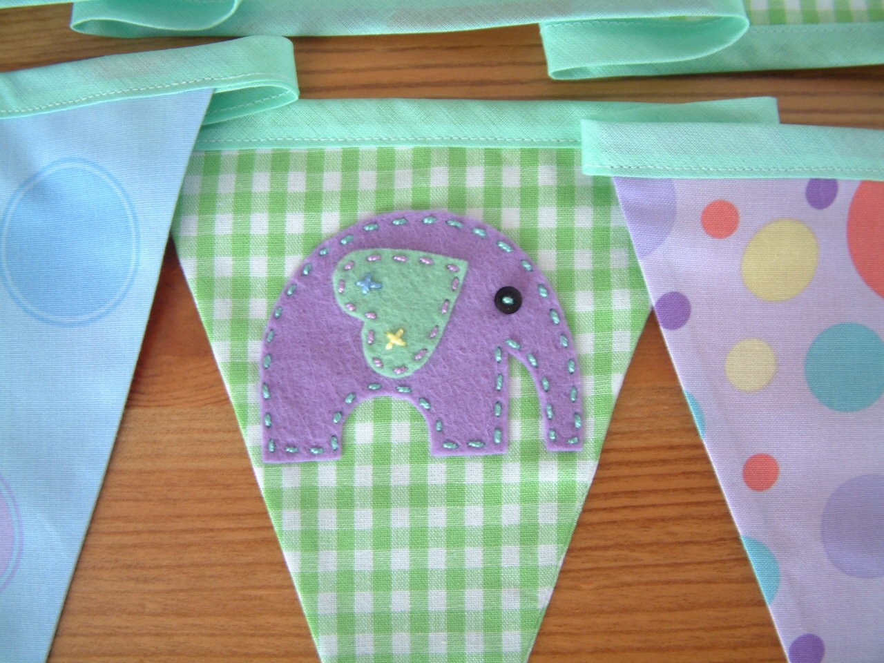 Bunting with elephant appliques nursery by patchworkpawprint