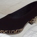 Black suede shoes with leopard platform and heel