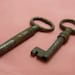 Pair of vintage ornate skeleton keys silver dark patina