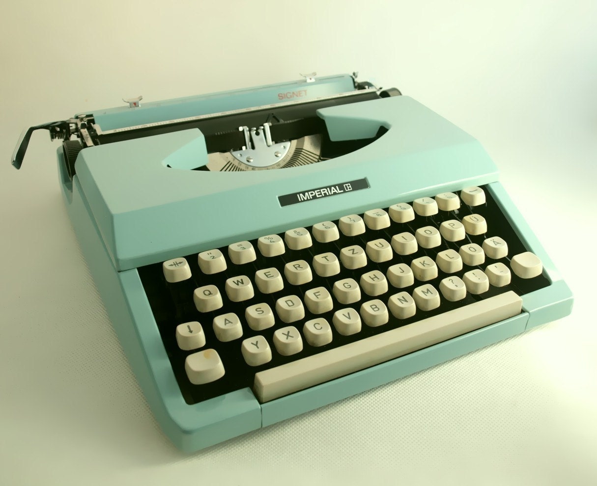 Vintage manual typewriter turquoise / aqua blue Imperial