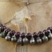 Garnet and antique silver"bells" necklace