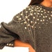 Metal studded pure wool one of the kind sweater