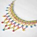 painted rhinestone necklace Cake