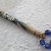 Painted Boxwood Midland Lace Bobbin - bouquet tied with blue ribbon