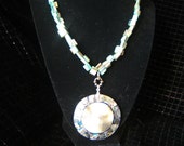 white mother of pearl abalone pendant with turquoise shells