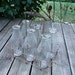Six Antique 1QT Glass milk bottles in Primitive Wire Carrier