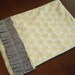 Blue green circles with grey pleated embellished diaper clutch