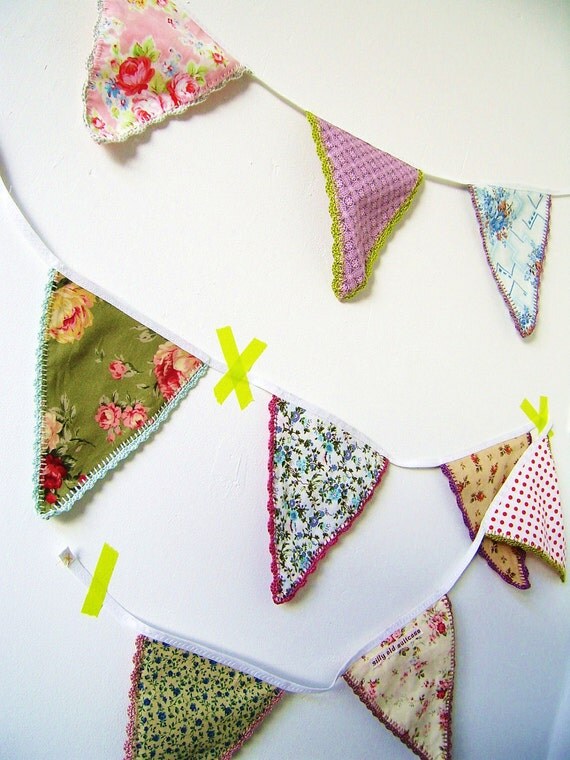 Fabric bunting flags with crochet edging.