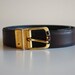 Vintage Pierre Cardin Brown Leather Belt with Gold Red and Black Buckle