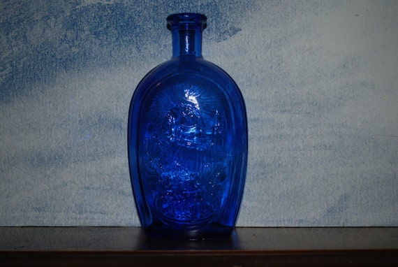 vintage blue glass bottle flask eagle and ship bottle