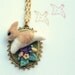 Whimsical needle felted hoping bunny with flowers pendant necklace, spring & Easter item