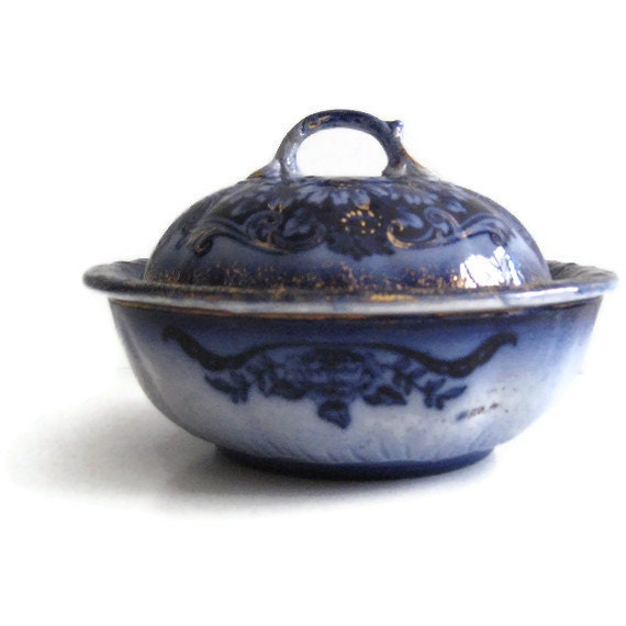 Vintage flow blue butter dish with gold trim