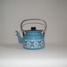 Finel Finland blue enamel tea kettle with tulip design