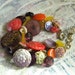 Vintage button bracelet purple orange yellow iridescent glass buttons