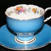 Paragon teacup and Saucer Blue with floral pattern within circa 1949-1952