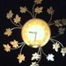 RESERVED for JALICAJIC -- Retro Gold Tone Starburst Wall Clock in Leaf and Vine Design c 1950 1960