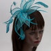 Turquoise Petal Sinamay Fascinator on a comb Wedding, Parties, Races, Proms